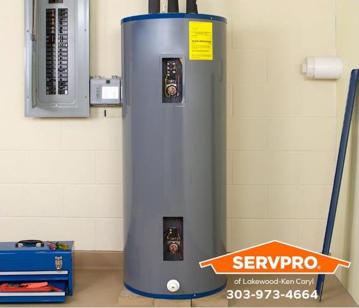 A new water heater is shown in a utility room.