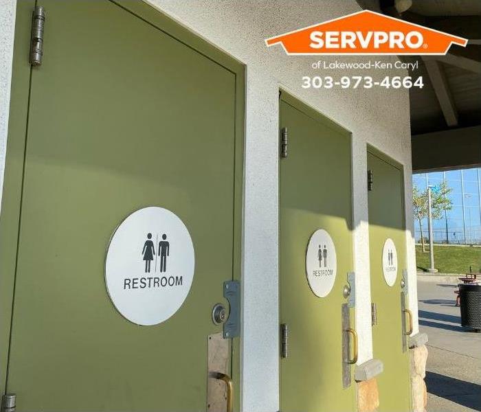 A row of public restrooms is shown.